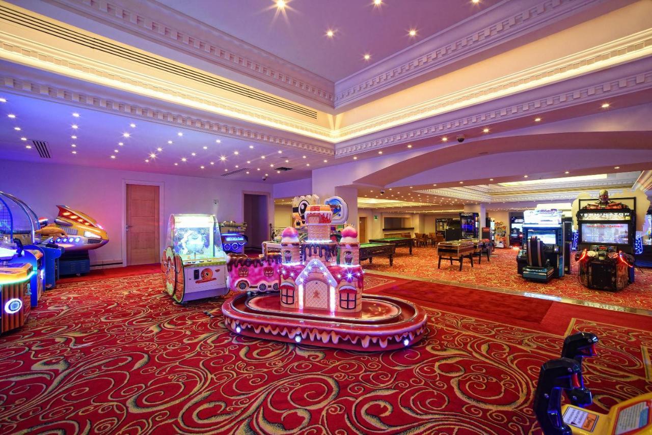 Acapulco Resort Hotel Agios Epiktitos Dış mekan fotoğraf The arcade at the Grand Hotel